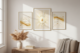Faith-inspired framed prints on a white wall in a cozy home decor setting